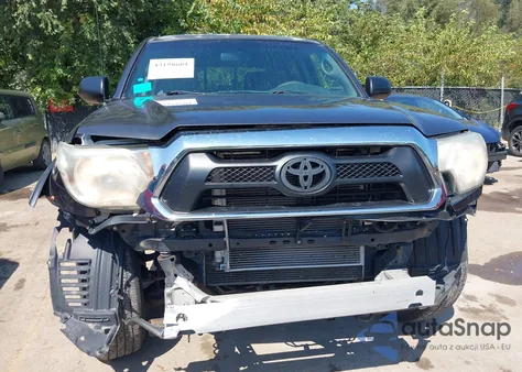 2013 Toyota Tacoma Base V6 z USA, uszkodzony, nr VIN 3TMLU4EN9DM106589